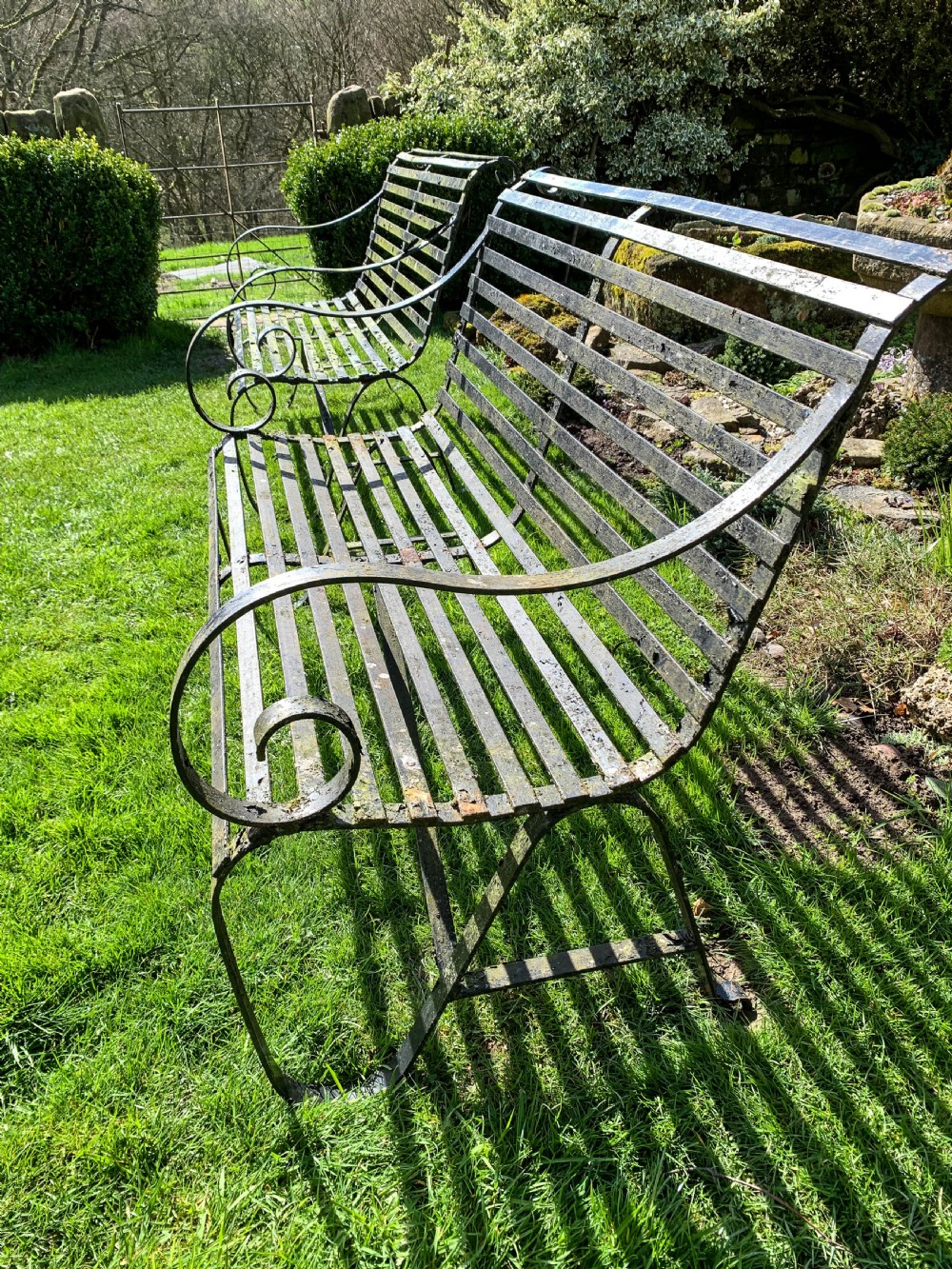 A Rare Matching Pair of Wrought Iron Garden Benches View III