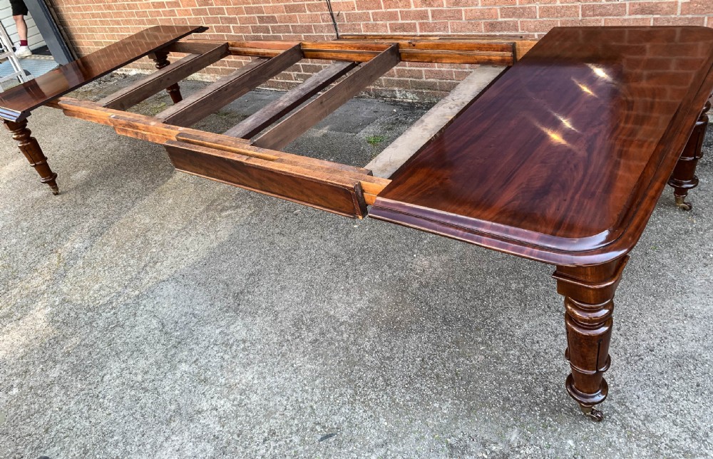 A Super Early Victorian Extending Dining Table View IV