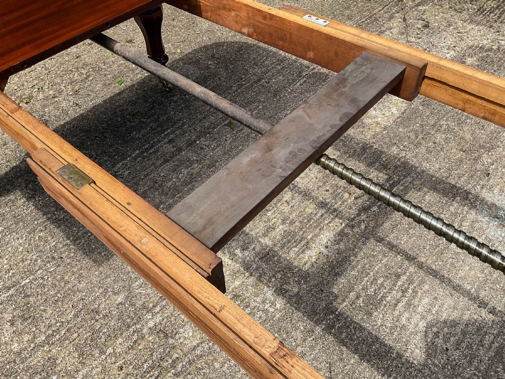 A Superb Early Victorian Extending Dining Table 4 leaves seats 12 View IV
