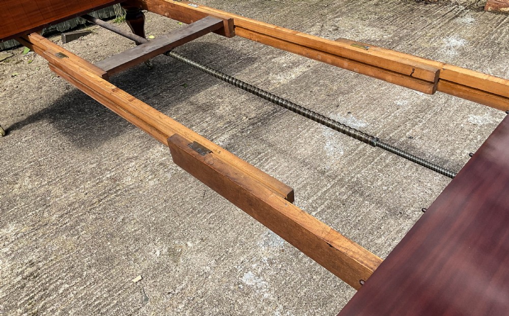 A Superb Early Victorian Extending Dining Table 4 leaves seats 12 View V