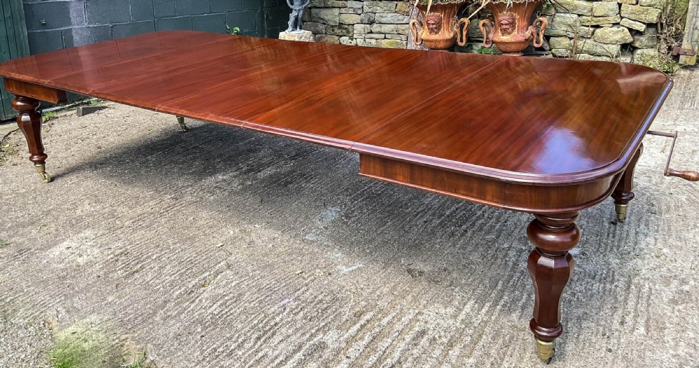 A Superb Early Victorian Extending Dining Table 4 leaves seats 12 View VIII