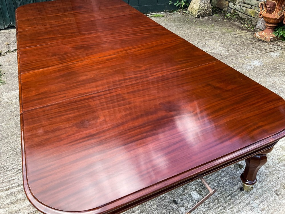 A Superb Early Victorian Extending Dining Table 4 leaves seats 12 View IX