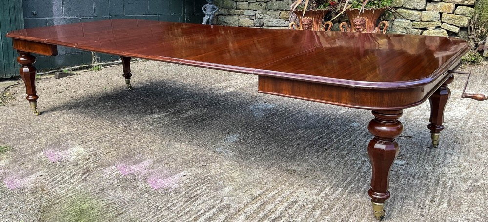 A Superb Early Victorian Extending Dining Table 4 leaves seats 12 View X