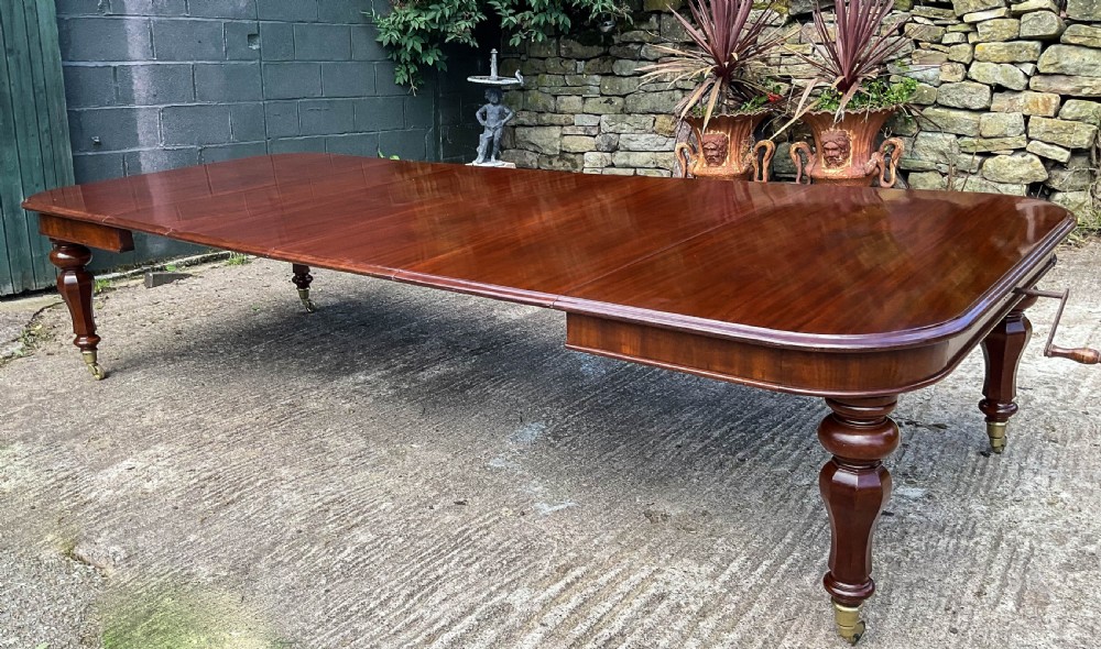 A Superb Early Victorian Extending Dining Table 4 leaves seats 12 View XII