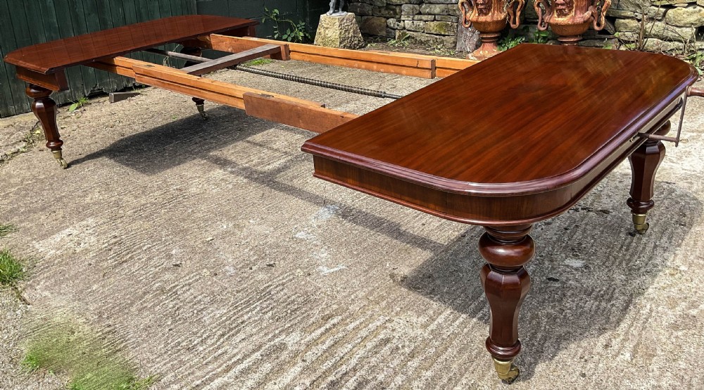 A Superb Early Victorian Extending Dining Table 4 leaves seats 12 View XIII