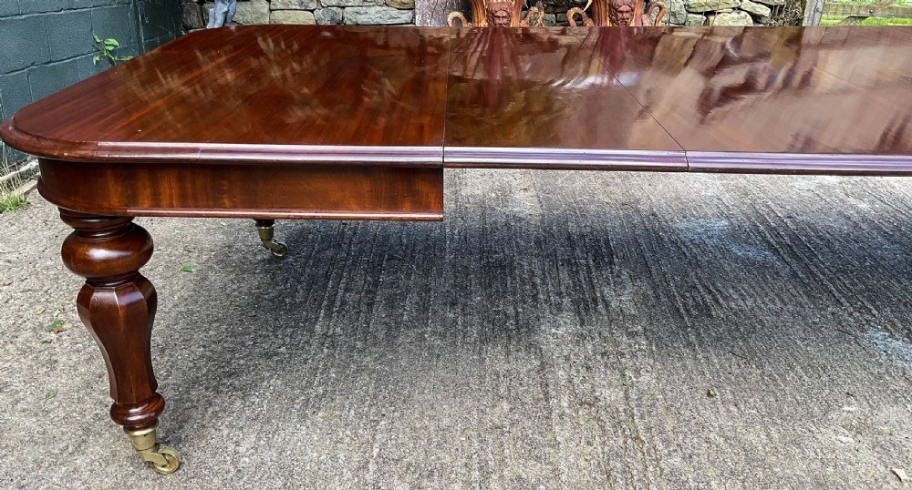 A Superb Early Victorian Extending Dining Table 4 leaves seats 12 View XX