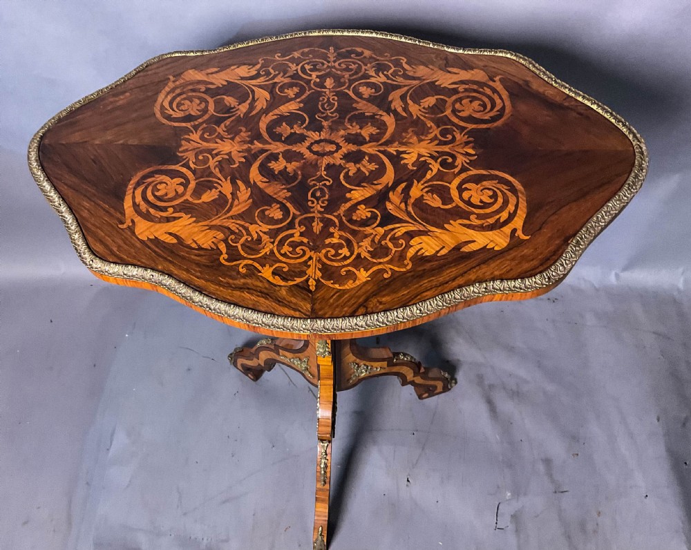 A super Kingwood and Rosewood  
 marquetry inlaid Table View X