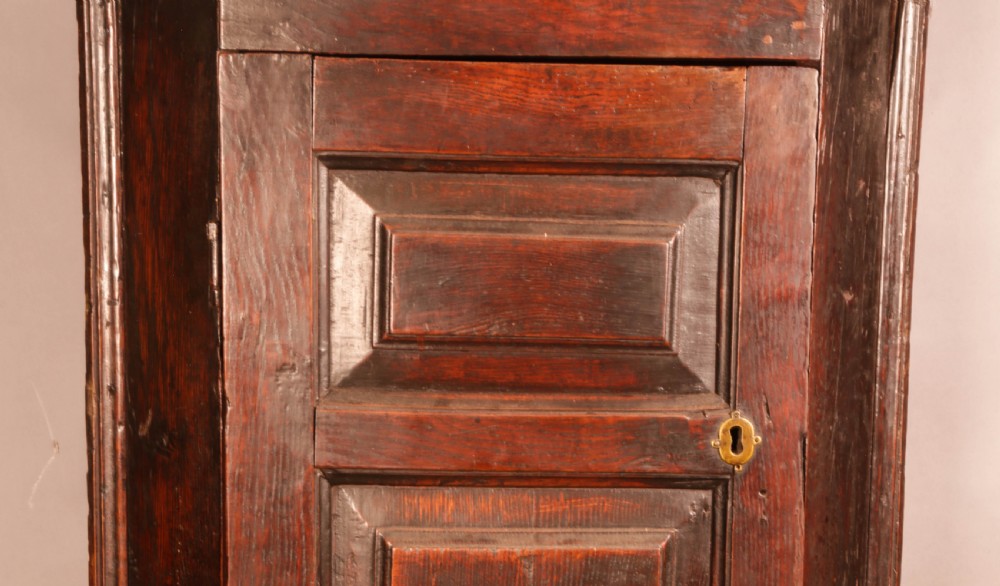 A Good Early Oak Corner Cupboard View II