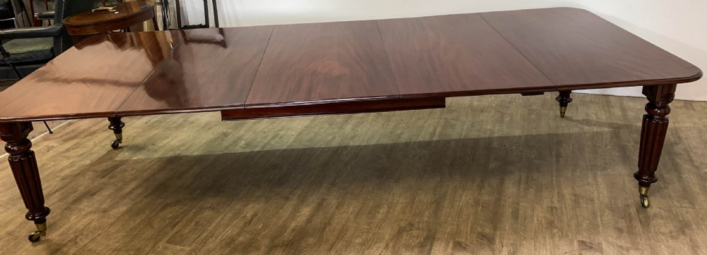 A Superb Georgian Extending Dining Table in Mahogany seats 12 View II