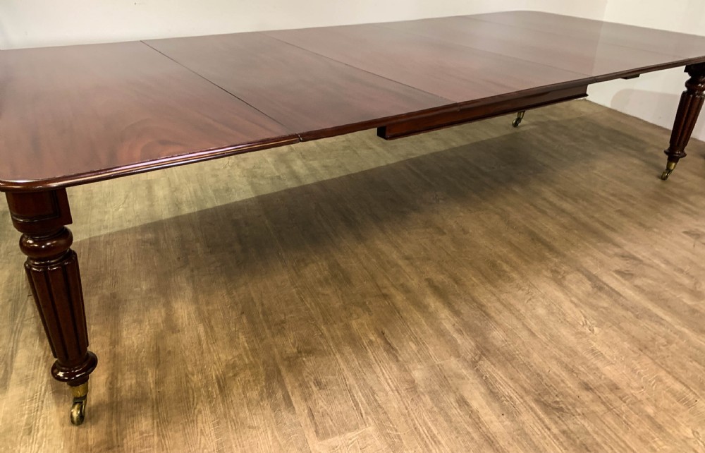 A Superb Georgian Extending Dining Table in Mahogany seats 12 View III