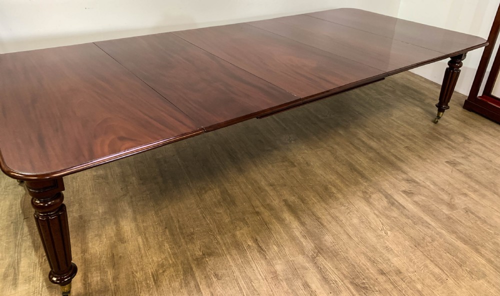 A Superb Georgian Extending Dining Table in Mahogany seats 12 View X