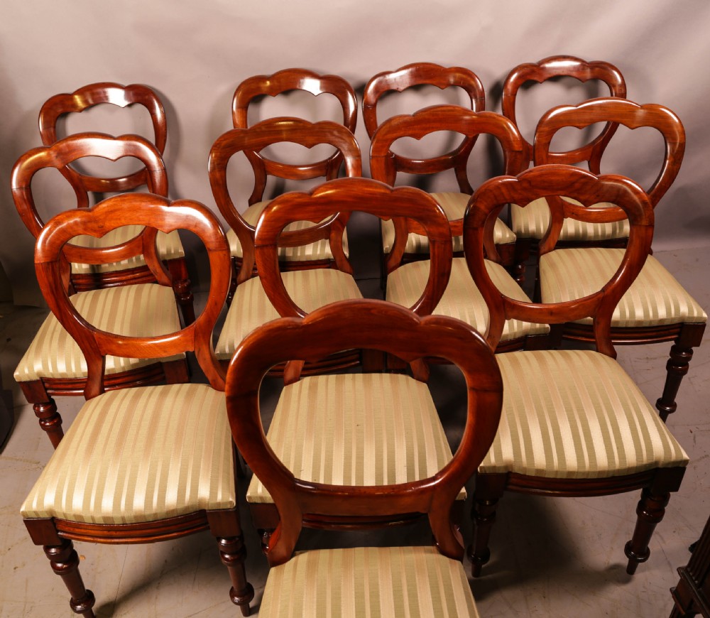 A Set of 12 Victorian Mahogany Balloon Back Dining Chairs View III
