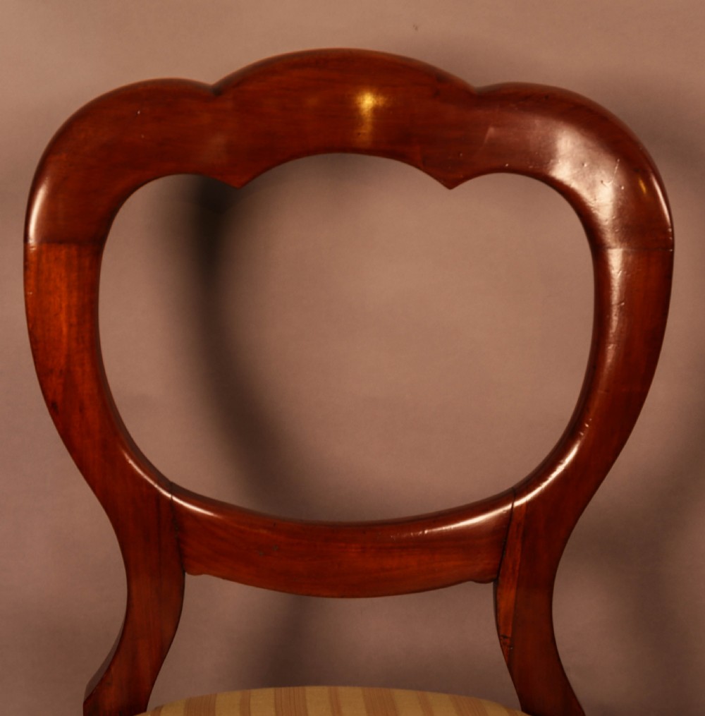A Set of 12 Victorian Mahogany Balloon Back Dining Chairs View IX