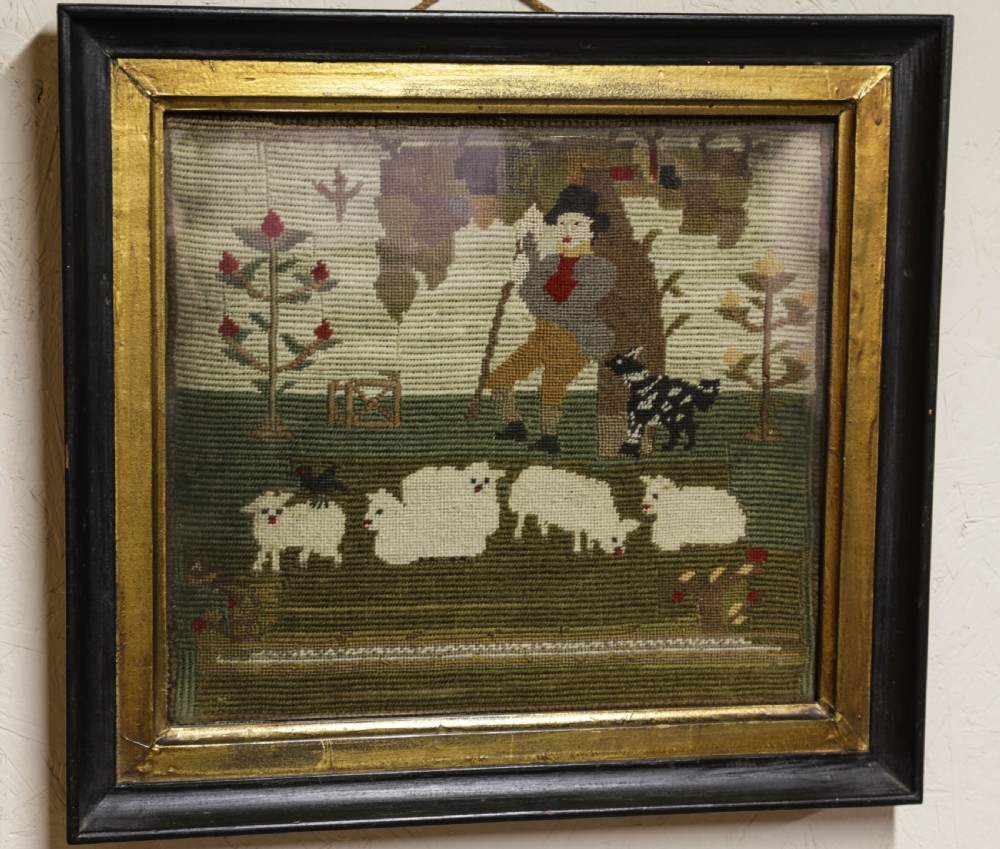 A Lovely Nieve Woolwork Picture of a shepard and his dog and Sheep