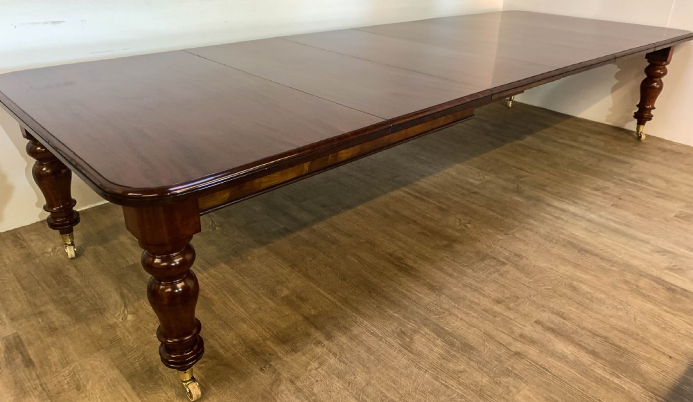 A Super Victorian Extending Dining Table in Mahogany seats up to 14