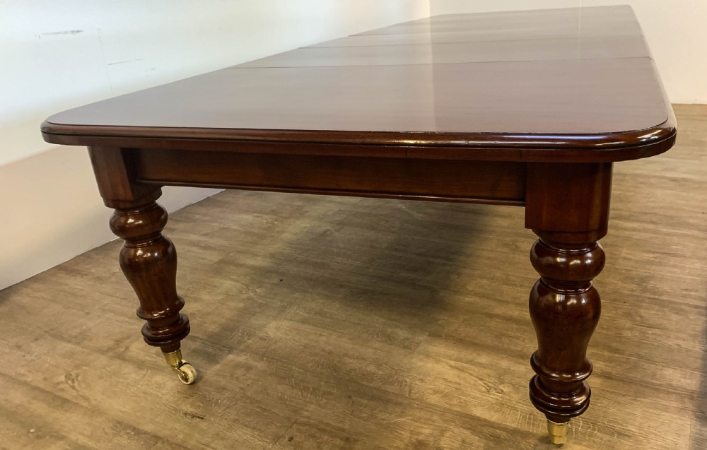 A Super Victorian Extending Dining Table in Mahogany seats up to 14 View V
