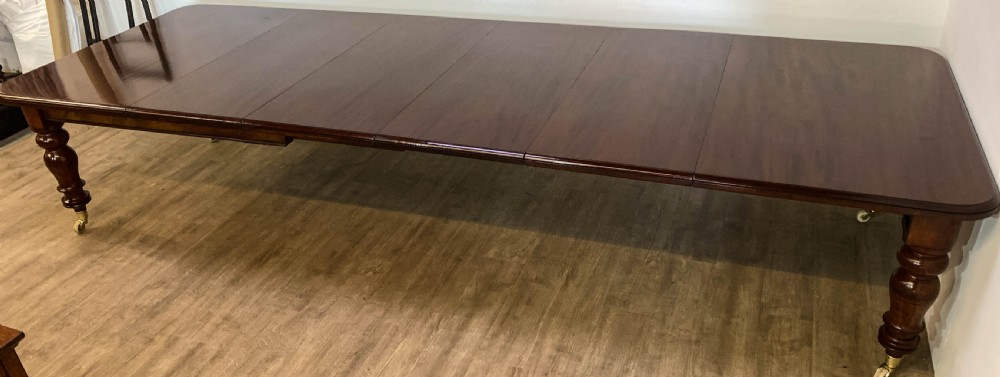 A Super Victorian Extending Dining Table in Mahogany seats up to 14 View VII
