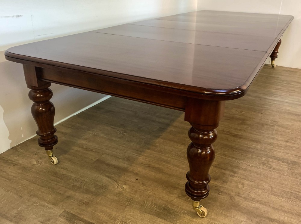 A Super Victorian Extending Dining Table in Mahogany seats up to 14 View XI