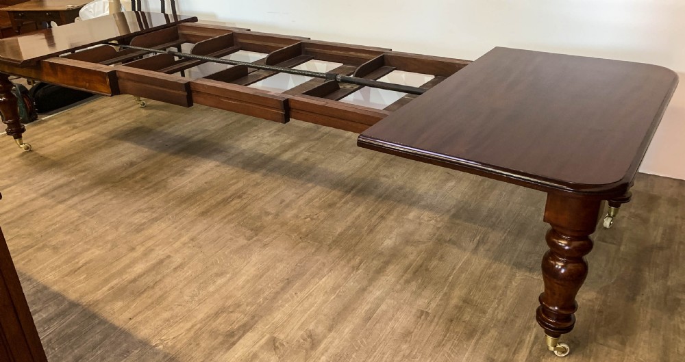 A Super Victorian Extending Dining Table in Mahogany seats up to 14 View XIII