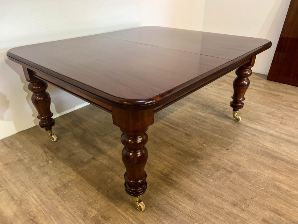 A Super Victorian Extending Dining Table in Mahogany seats up to 14 View XVII