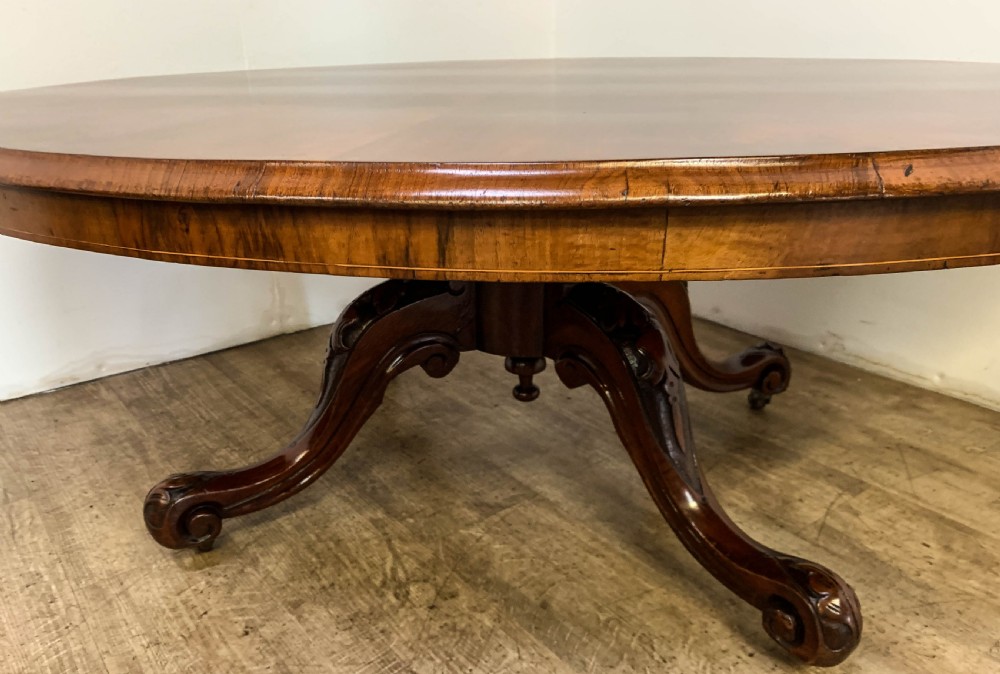 A Victorian Ovel Coffee Table in Walnut View III