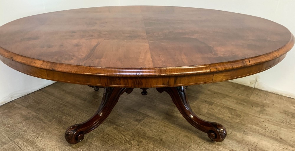 A Victorian Ovel Coffee Table in Walnut View VI