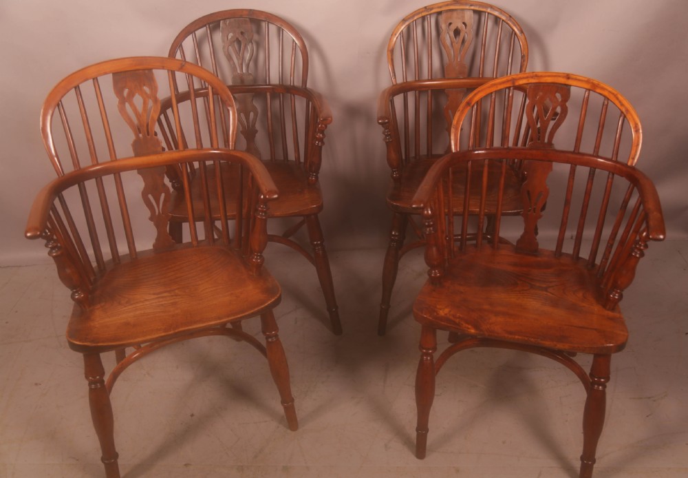 A Harlequin set of 4 Yew Wood Windsor Chairs
