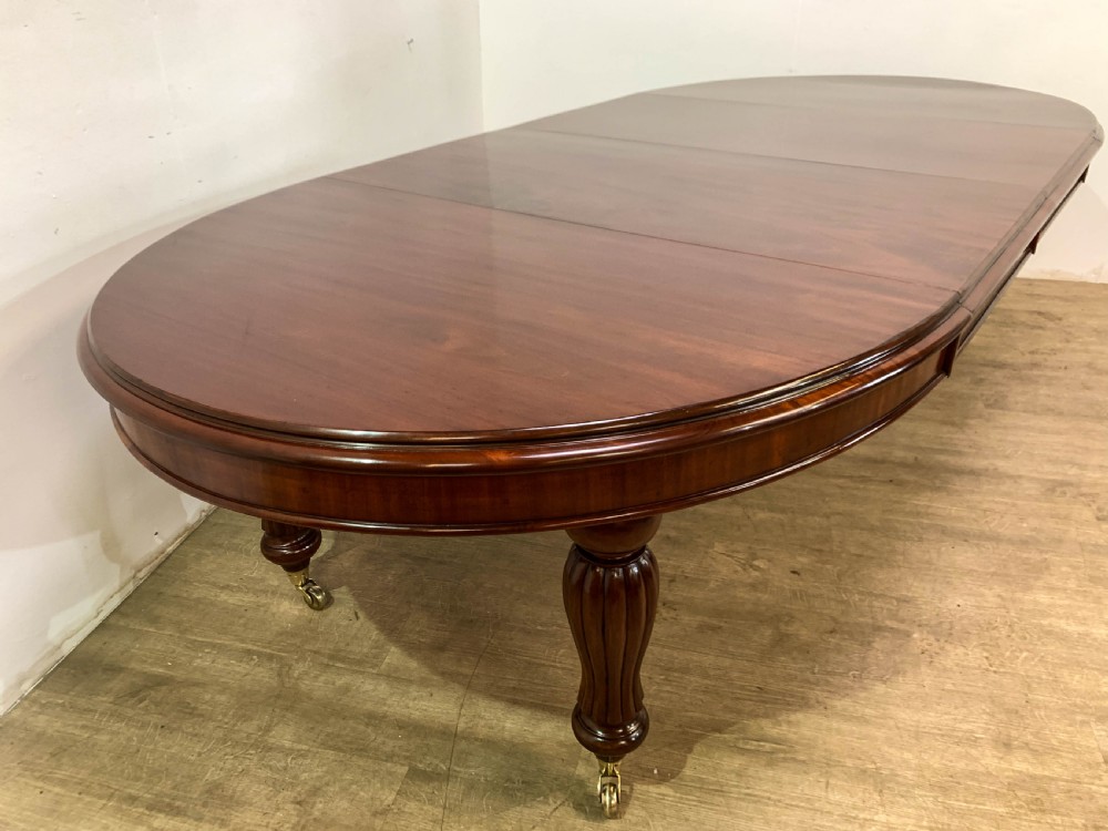 A Superb Victorian Extending Dining Table Mahogany seats 10/12