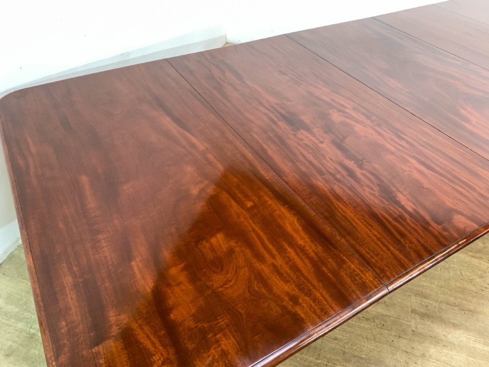 A superb Early Victorian Mahogany Extending dining Table with 3 leaves seat 14 View IV