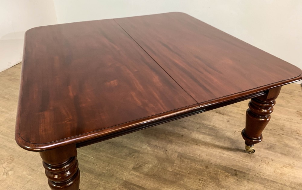 A superb Early Victorian Mahogany Extending dining Table with 3 leaves seat 14 View XXIII