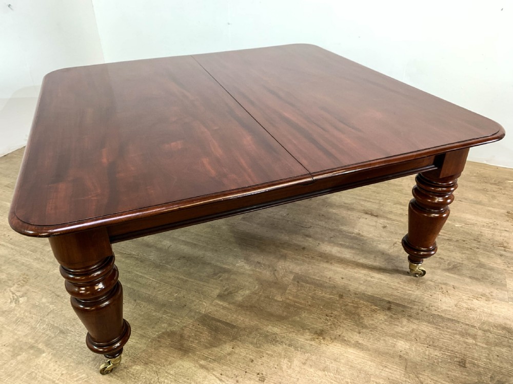 A superb Early Victorian Mahogany Extending dining Table with 3 leaves seat 14 View XXIV