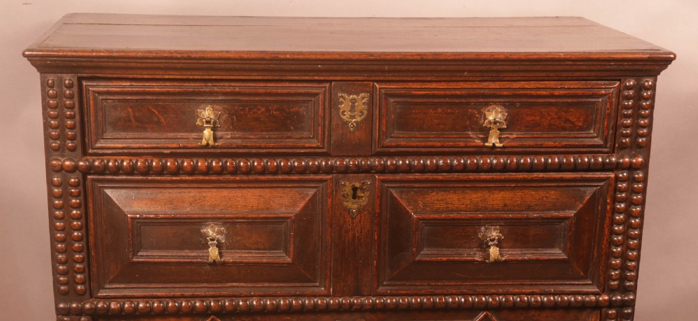 A 17th century moulded front chest of drawers in Oak View II
