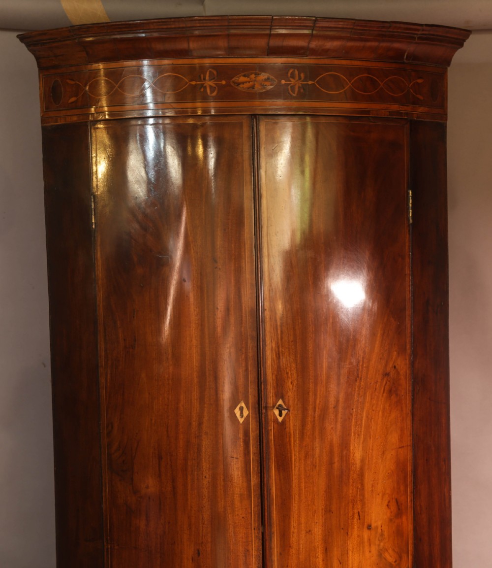 A Georgian Bow Front Corner cupboard Mahogany Inlaid View II
