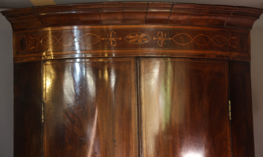 A Georgian Bow Front Corner cupboard Mahogany Inlaid View III