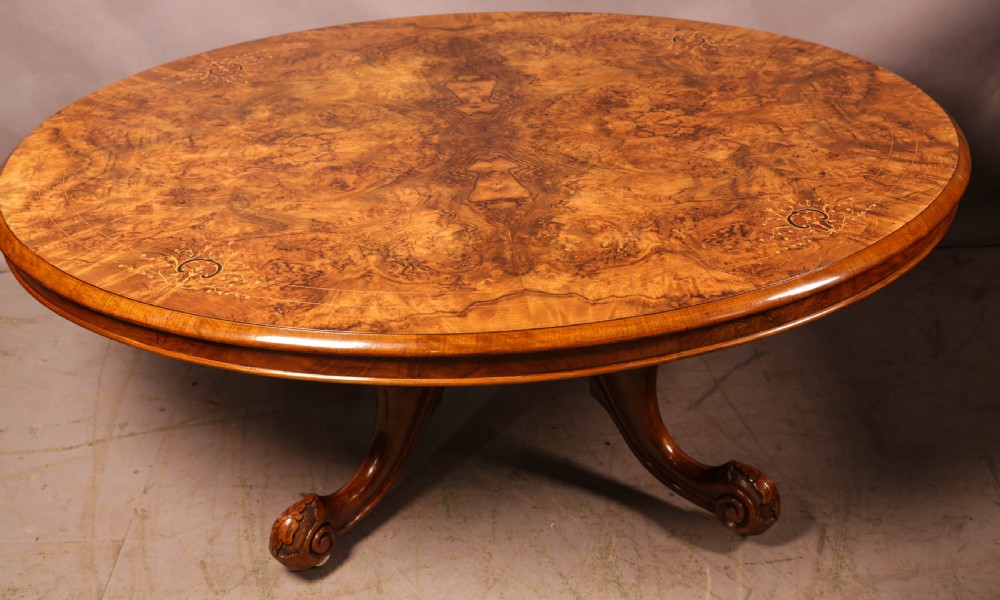 A Victorian Burr Walnut coffee Table ( adapted )