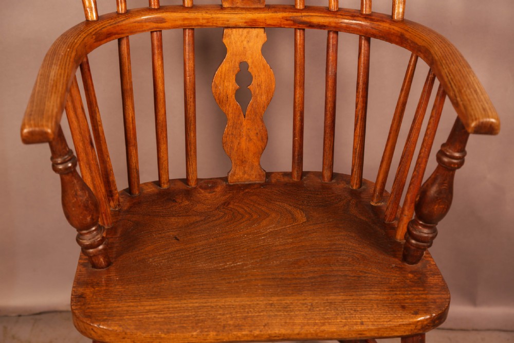 A Victorian High Back Windsor chair stick arm View V