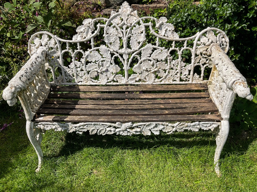 A Victorian Cast Iron Garden bench very fancy