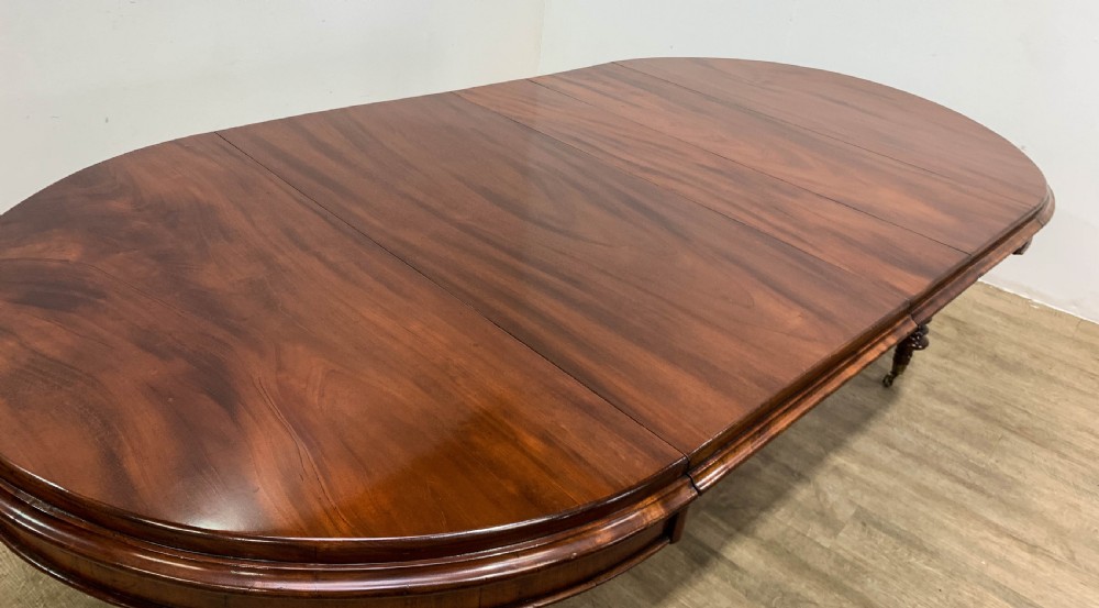 A Good Victorian mahogany Wind out Dining Table seats 10 View II