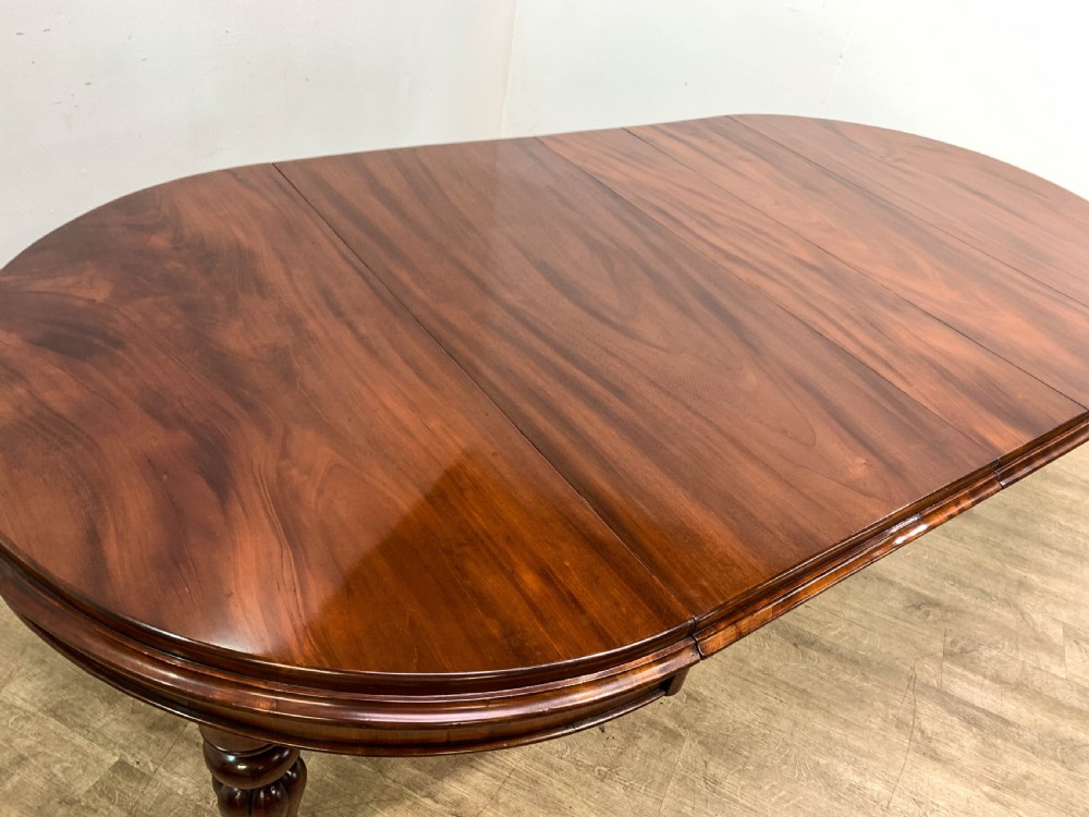 A Good Victorian mahogany Wind out Dining Table seats 10 View IV