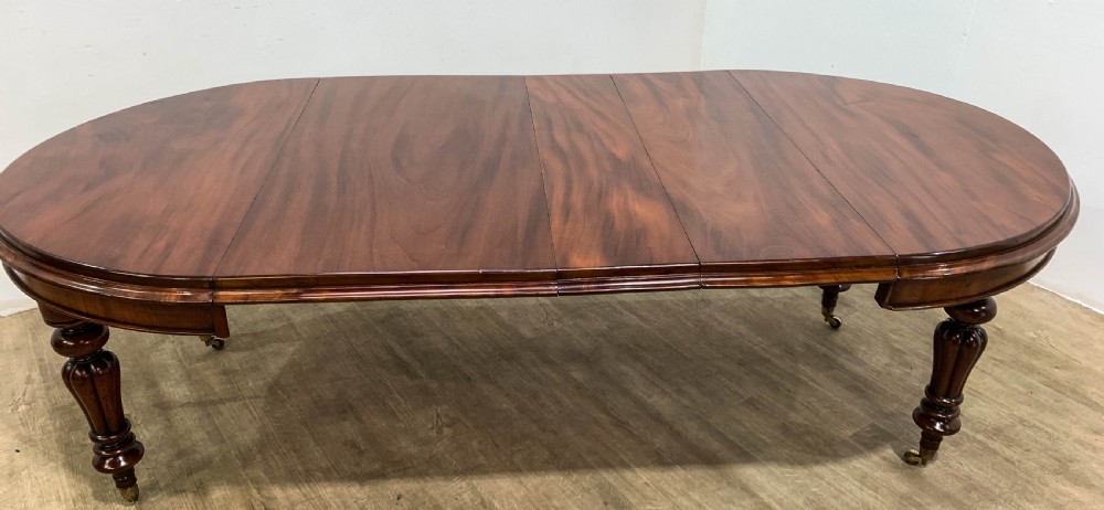 A Good Victorian mahogany Wind out Dining Table seats 10 View V