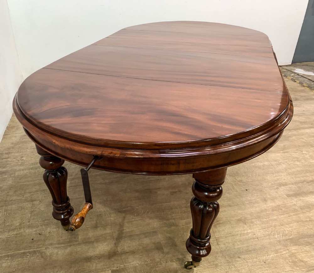 A Good Victorian mahogany Wind out Dining Table seats 10 View VI