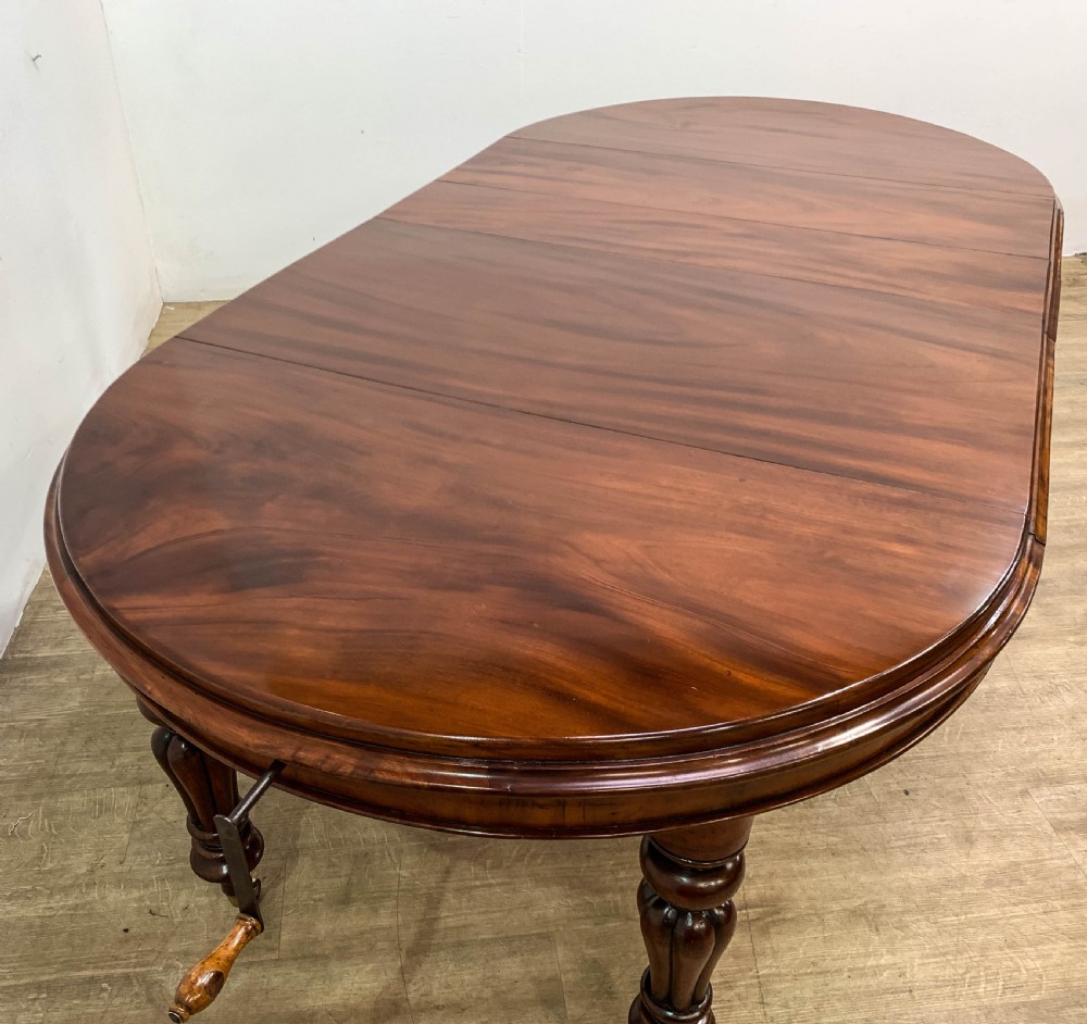 A Good Victorian mahogany Wind out Dining Table seats 10 View IX
