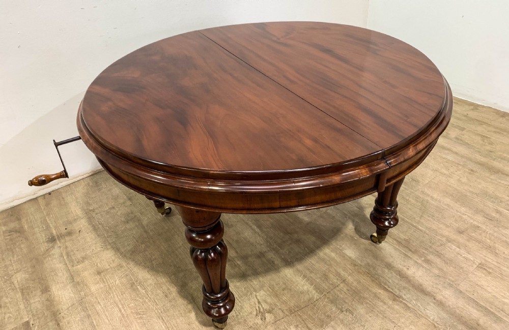 A Good Victorian mahogany Wind out Dining Table seats 10 View X