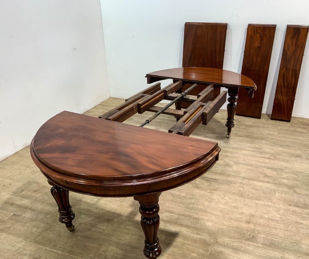 A Good Victorian mahogany Wind out Dining Table seats 10 View XI