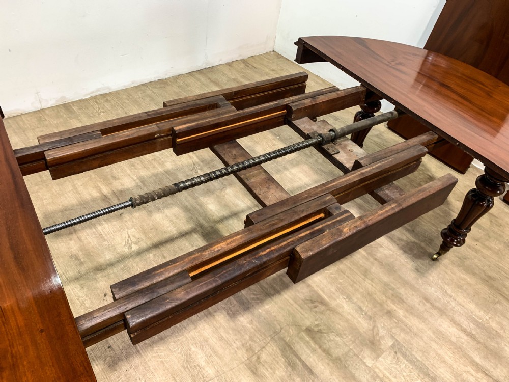 A Good Victorian mahogany Wind out Dining Table seats 10 View XIII