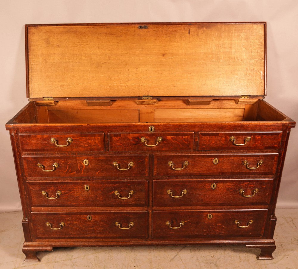 An Oak Dower Chest lift top and 4 drawers View V