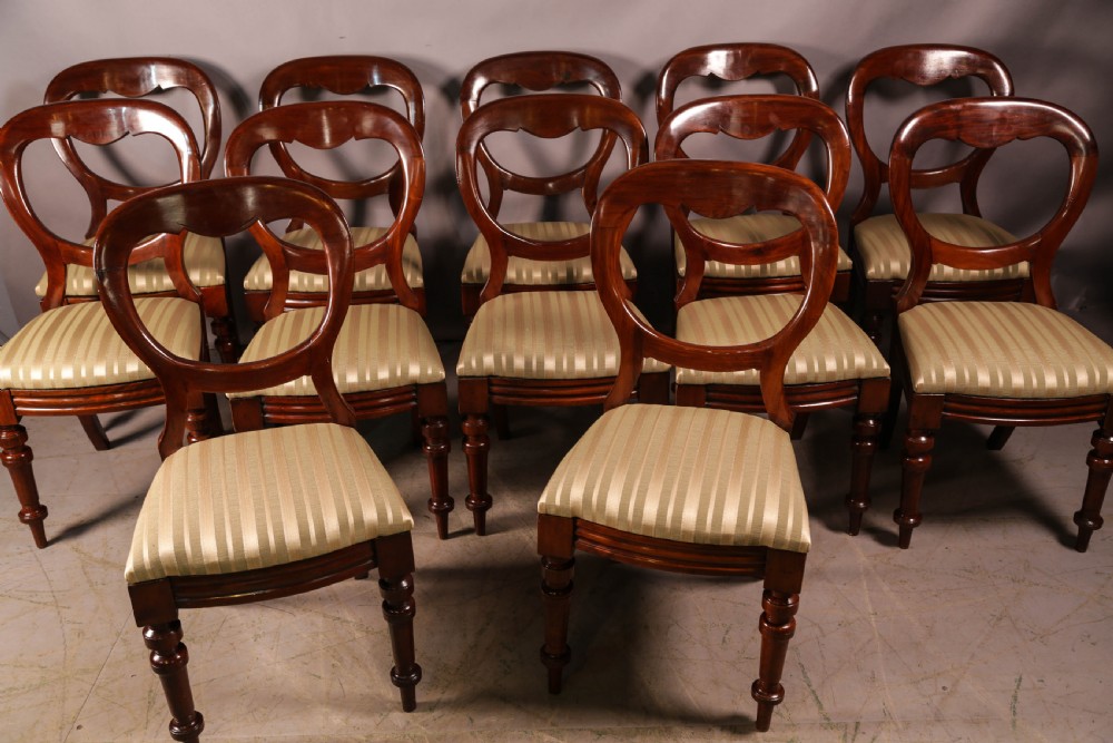A Set of 12 victorian Mahogany Balloon Back Dining Chairs