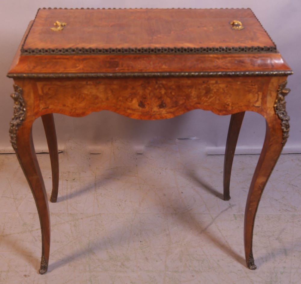 A Victorian Burr Walnut Cellorette