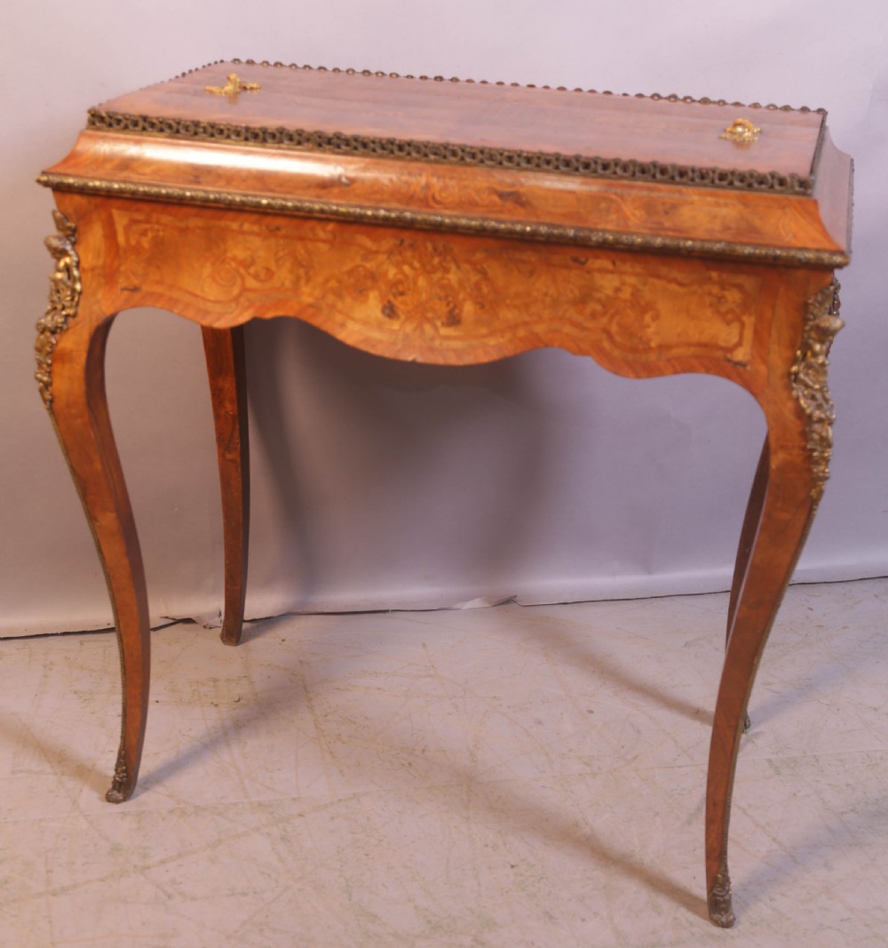 A Victorian Burr Walnut Cellorette View VII