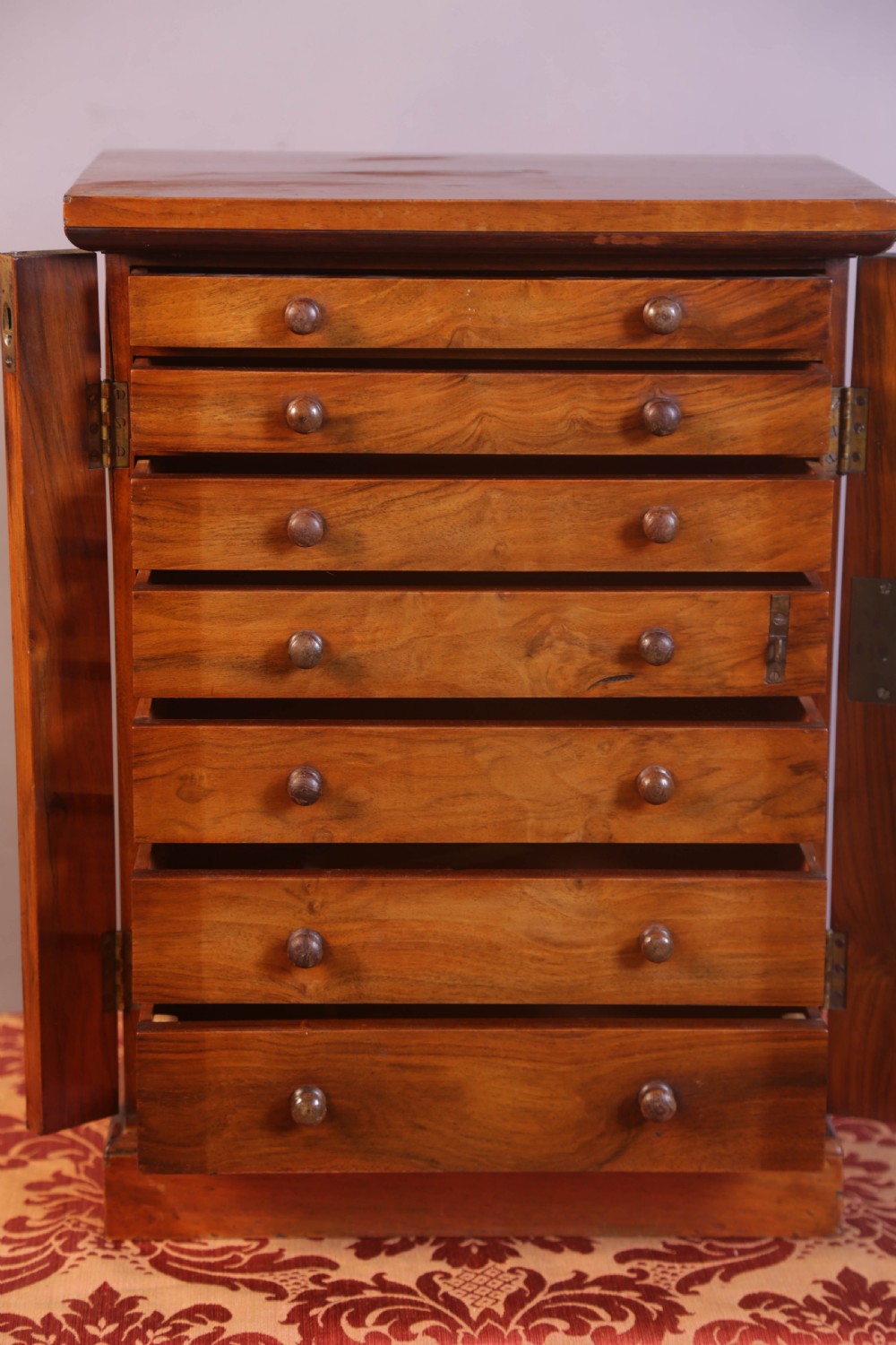 A Miniature Wellington Chest in Walnut View II